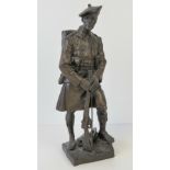 A bronze resin figure of a 51st Highlander in standing pose after a bronze statue by George Henry