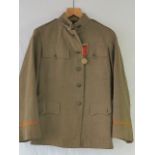 A WWI US New York Regiment Machine Gun Unit jacket, dated 1916, having medal for Expert Marksman.