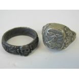 Two WWII German rings; SS Deaths Head ring, and a Krim signet ring.