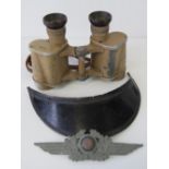 A WWII German Afrika Corps Officers peak and metal wings (from cap),