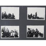 A WWII German photograph album complete with photographs including; female and family groups,
