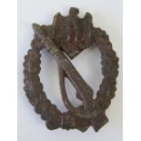 A WWII German battlefield find Infantry Assault badge, pin deficient - rusty condition.