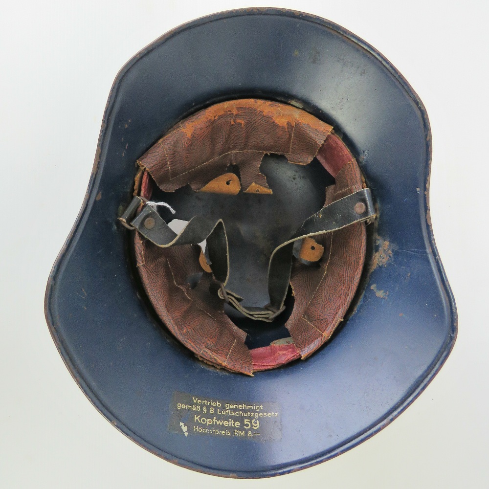 A WWII German Luftschutz helmet having single decal to front, label within, - Image 3 of 3