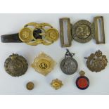 A brass 2nd Warwickshire Regiment belt buckle, together with a miniature brass compass,