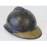 A French WWI Adrian helmet marked 'Soldat De La Grande Guerre 1914-1918' having original liner and