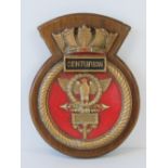 A Naval cast alloy crest plaque for HMS Centurion, on a wooden shield, 20cm.