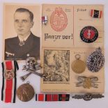 A quantity of WWI and WWII German badges including an enamelled Mussert Garde 1939-1940 badge,