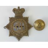 A Victorian shako plate helmet badge and matching tunic button for the 58th Regiment (Rutland).