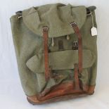 A mid 20thC Swiss Army canvas and leather rucksack