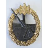 A WWII German Coastal Artillery badge marked K&Q to pin.