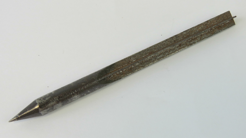 A WWII German flechette, 12cm in length.