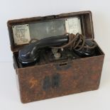 A WWII German field telephone having ori