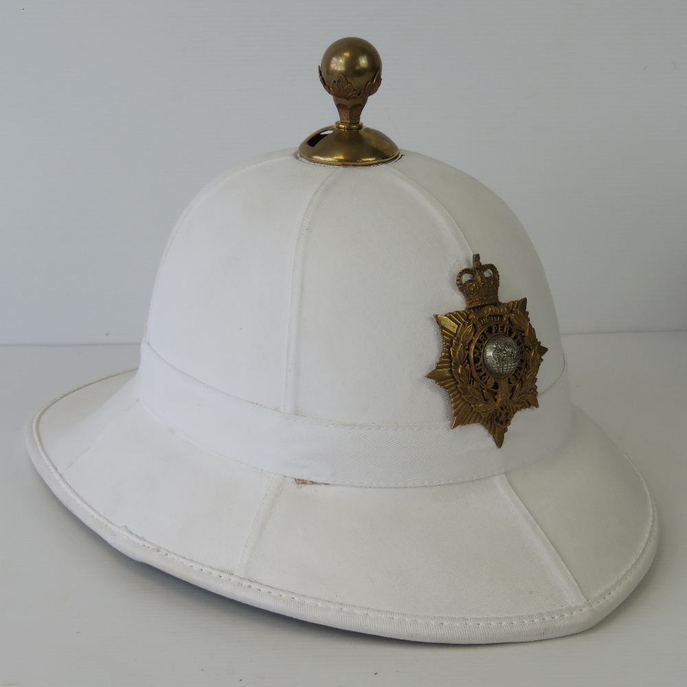 A Royal Marine Officers pith helmet with