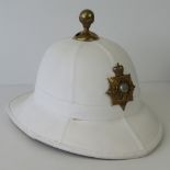 A Royal Marine Officers pith helmet with