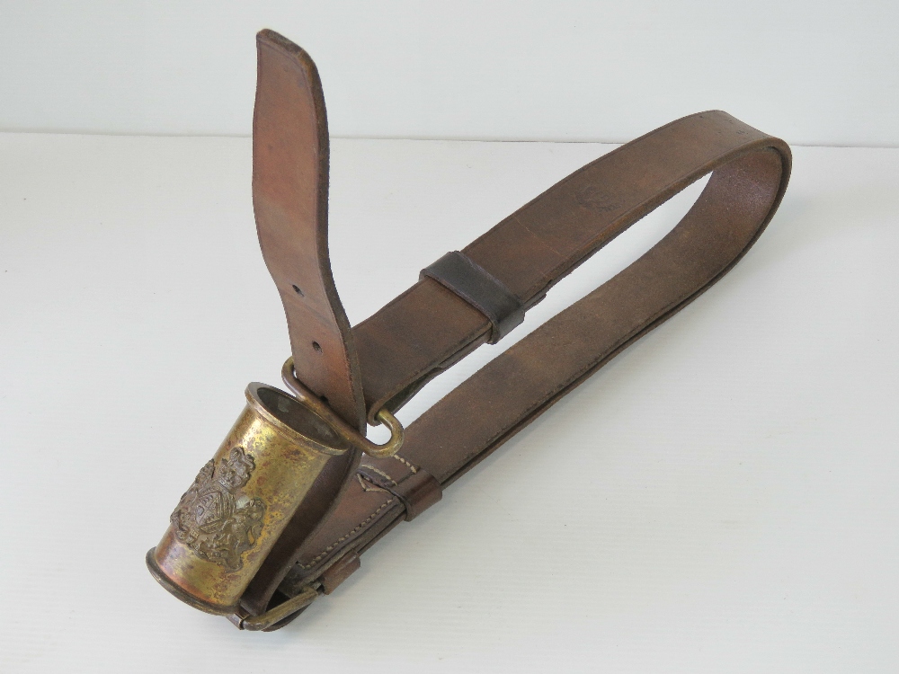 A Victorian brown leather belt having br