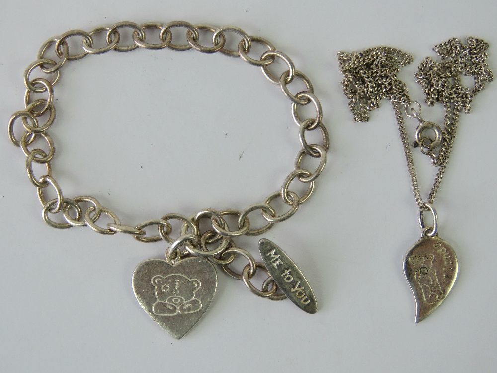 A silver 'Me To You' charm bracelet havi