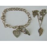 A silver 'Me To You' charm bracelet havi