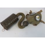 A Italian M31 military gasmask with extr