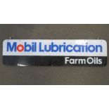 A c1970s dealership Mobile Lubrication Farm Oils hanging sign in perspex, 38 x 150cm.