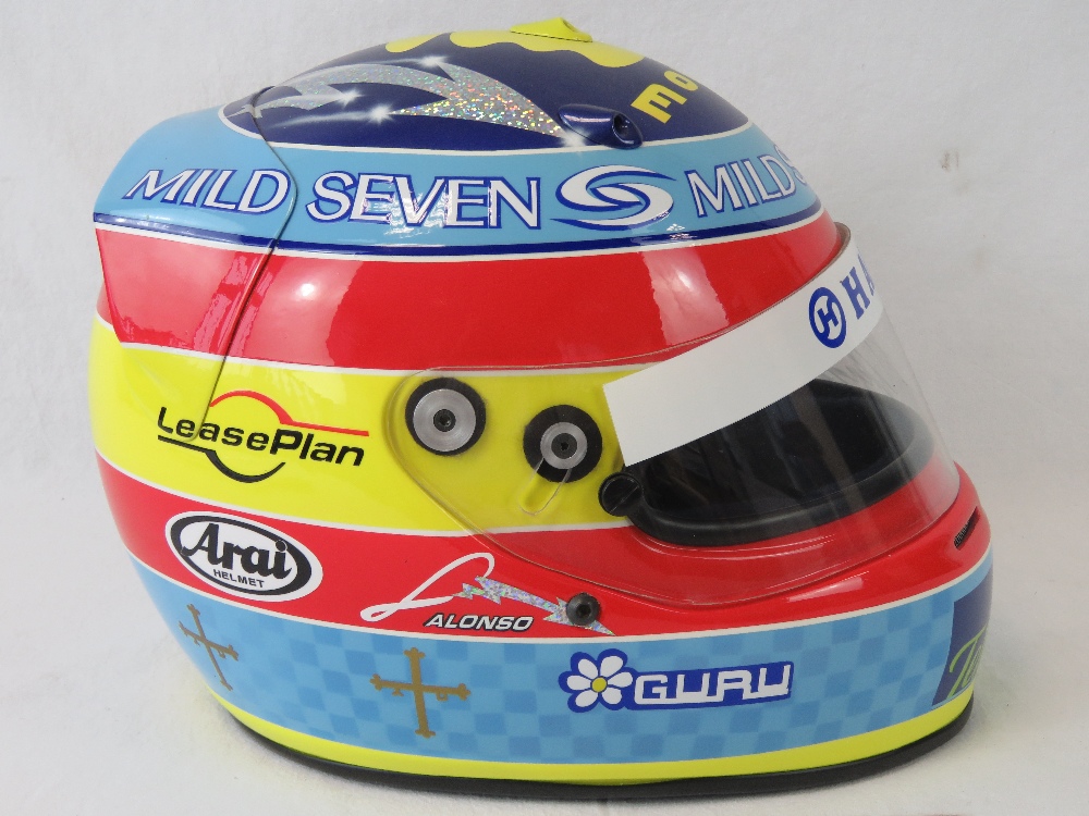 A fine recreation presentation copy of Fernando Alonso's 2005 F1 World Championship helmet