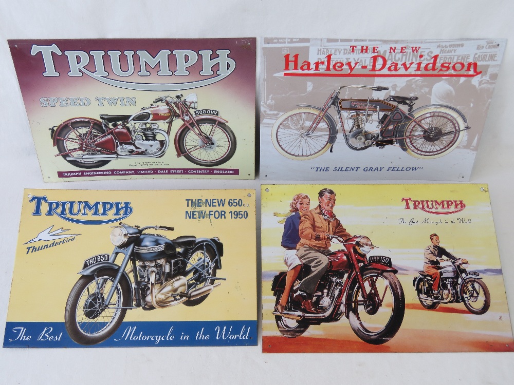 Four contemporary tin plate embossed signs, three for Triumph and one for Harley Davidson.