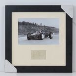 Jim Clark, autograph in pencil mounted with a monochrome photograph, framed and glazed.