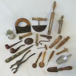 Vintage kitchenalia including cutters, thermometers, taps, markers and two pipes,