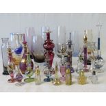 A collection of art glass vases and perfume bottles.