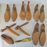 A quantity of vintage wooden shoe lasts.