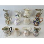 A collection of jugs including a majolica relief moulded jug, 17cm high,