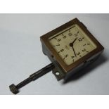 A 1940s square cased car clock, the dial signed "Smiths, M.A". Cas size 64mm x 64mm x 45mm.