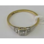 An 18ct gold and platinum diamond ring,