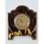 A delightful Art Deco HM silver and tortoiseshell freestanding easel desk clock made by Charles &