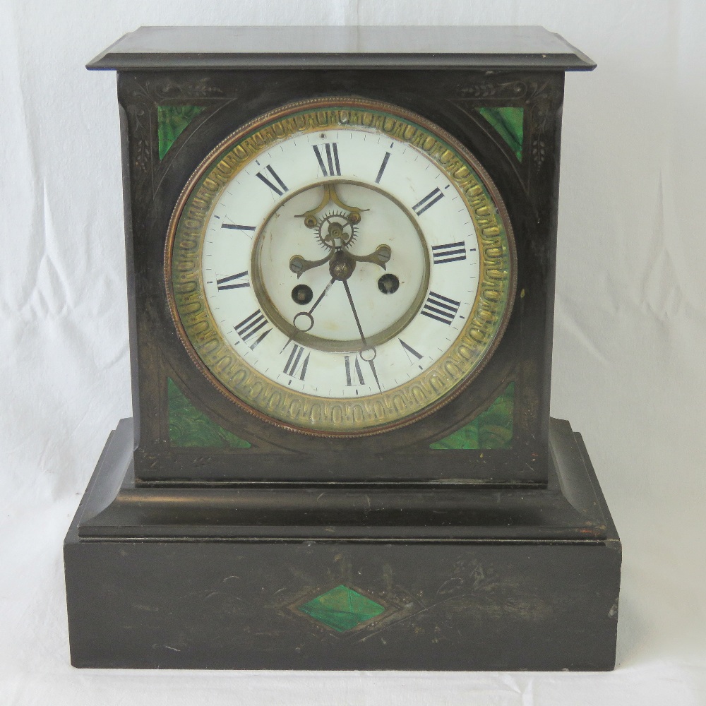 A good square shaped Victorian polished slate mantle clock having inset malachite decoration,