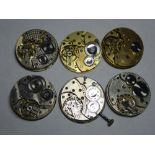 Swiss pocket watch movements for spares or repair, including a Corterbert example. Six items.