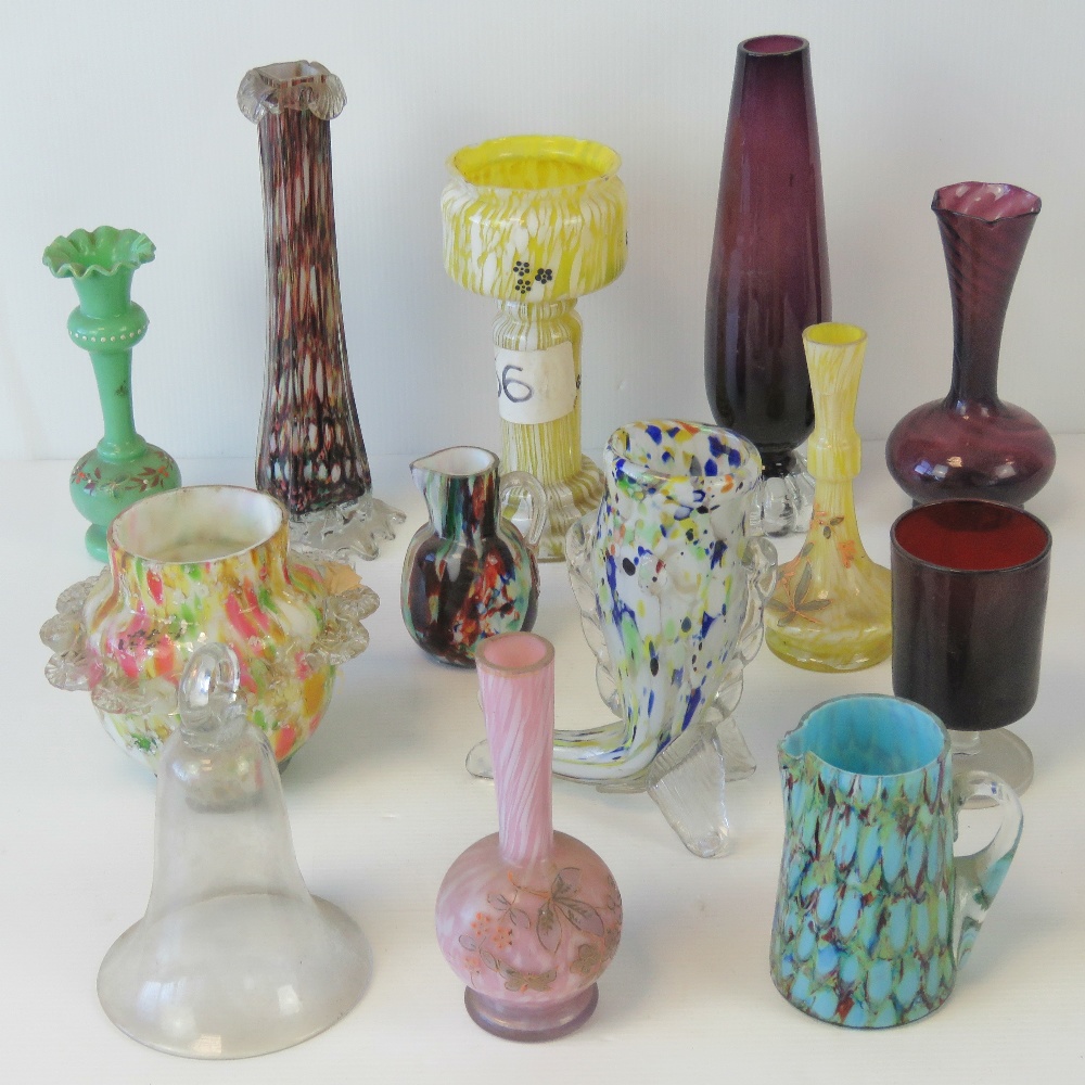 A quantity of assorted coloured glassware including Murano style and Venetian glass vases.