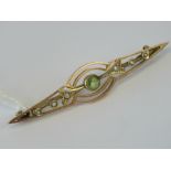 A delightful Edwardian 9ct gold peridot and seed pearl brooch weighing 3.3g.