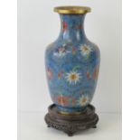 A fine early 20th century turquoise blue ground cloisonné having foliate decoration throughout,