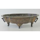 A 19th century Oriental cast bronze censer raised over four legs and weighing 1.99kg, 30 x 19cm.