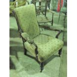 An Edwardian high back elbow chair for re upholstery.