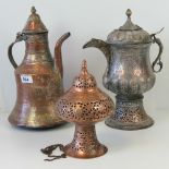 A 19thC Kashmiri copper samovar of semi fluted design with profuse decoration and raised on a