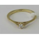 An 18ct gold and platinum solitaire diamond ring, round brilliant cut diamond (approx 2.