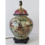 A lamp base in the form of an Oriental ginger jar having mountain scene with warriors on horseback