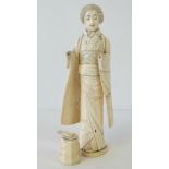 A 19th century carved ivory Japanese Geisha girl having hinged arms and carrying and octagonal bowl