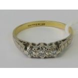 An 18ct gold and platinum diamond ring,