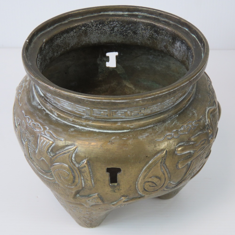 A Chinese brass censor of swollen tapered design incorporating three feet, - Image 4 of 7