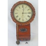 A good drop dial mahogany wall clock having 12" painted dial with Roman numerals,