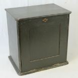 A late Victorian painted pine collector's cabinet with seven drawers enclosed by a fall front,