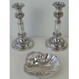 A delightful silver plated scallop shell dish raised over three conch shell feet,