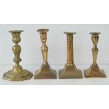 Three 18thC brass candlesticks and a brass rococo style candlestick,